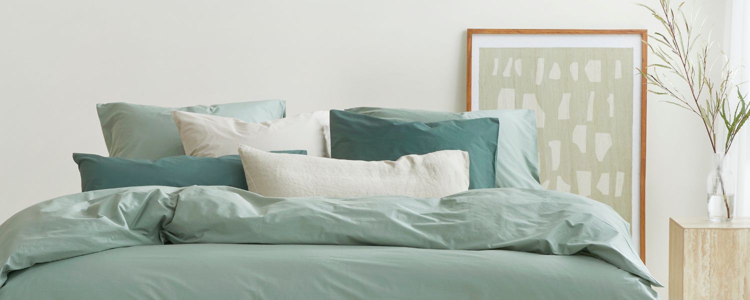 Bed met verschillende maten kussens SEO_blog_landscape_1__8